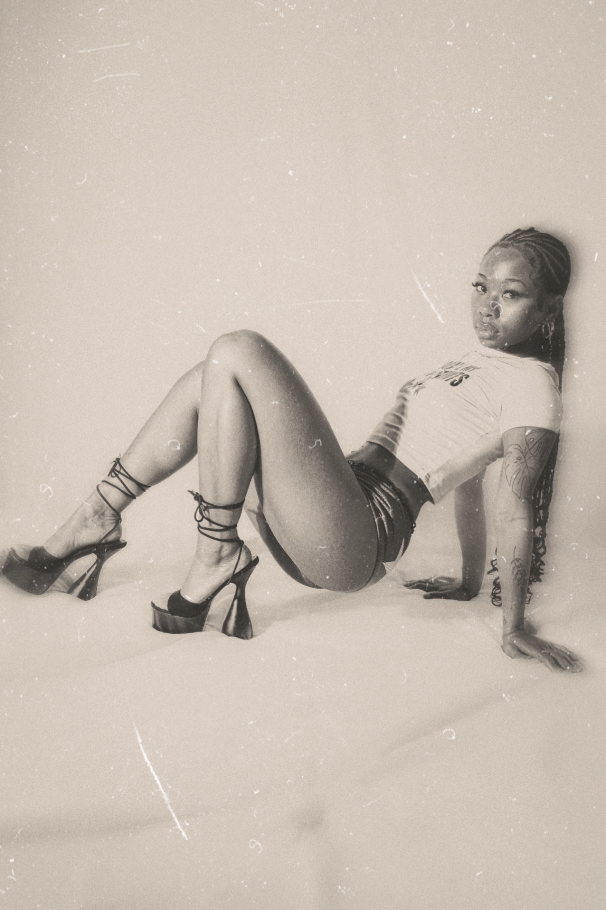 Editorial studio portrait with film grain finish