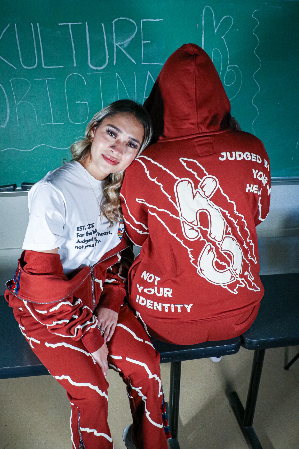 Creative brand session in a classroom with matching streetwear sets
