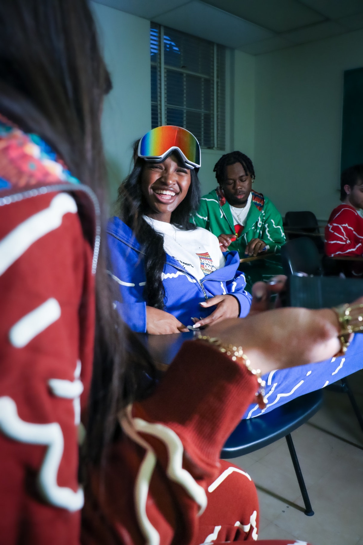 Candid event coverage — laughter in a themed group session